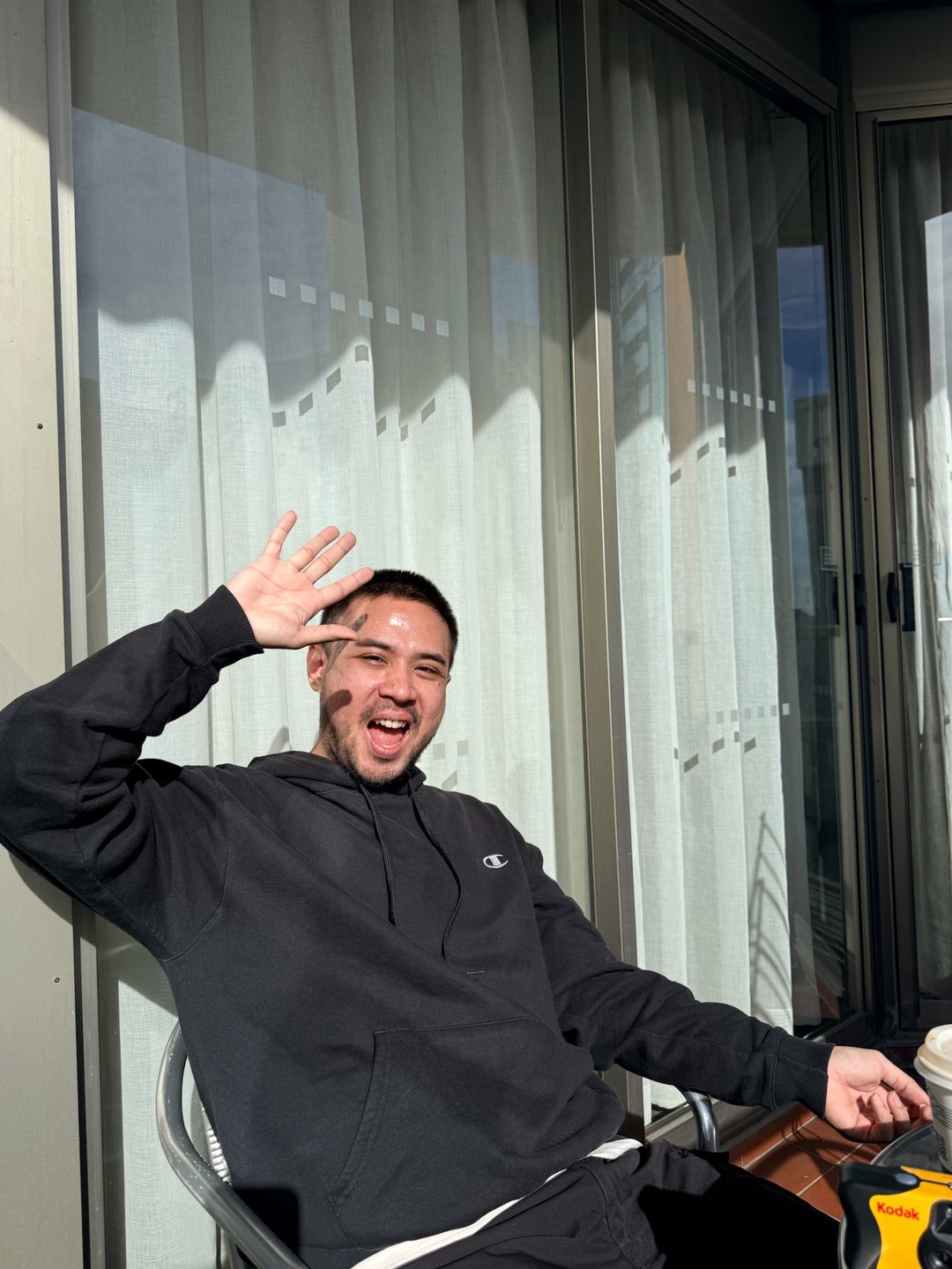 Me, on a sunny balcony